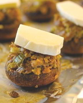 Фаршированные грибы с оливками и орехами