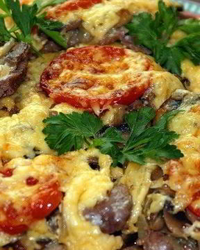 Свинина в духовке с грибами