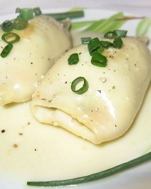 Кальмары, фаршированные овощами