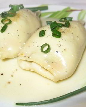 Кальмары, фаршированные овощами