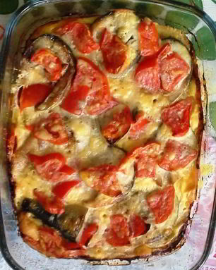 Скумбрия с овощами под сметанной заливкой