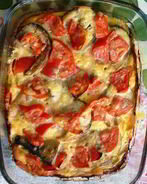 Скумбрия с овощами под сметанной заливкой