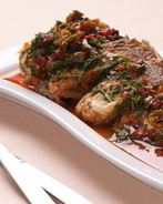 Рыбное жаркое с овощами, анчоусами и томатным соусом