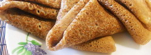 сладкие роллы из шоколадных блинчиков с клубникой и лимонным курдом. Шаг 5